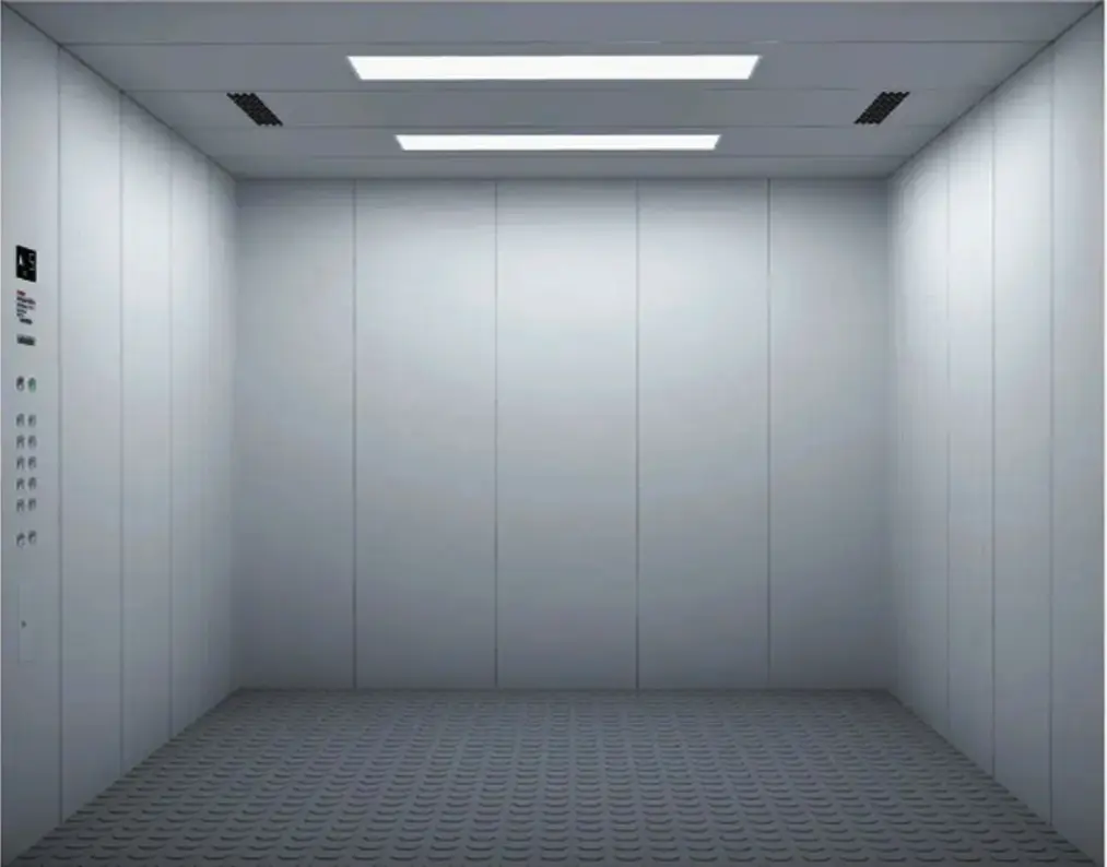 A large white cargo elevator with a light mounted on the wall, designed for transporting goods.